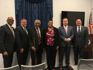 Rep. Danny K. Davis (D-IL), long-time reentry champion in Congress, with panelists from a Second Chance Month Congressional briefing on reentry and workforce development.